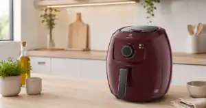 Air fryer electrolux 5l gasta muita energia? Vista frontal do modelo Electrolux em uma cozinha